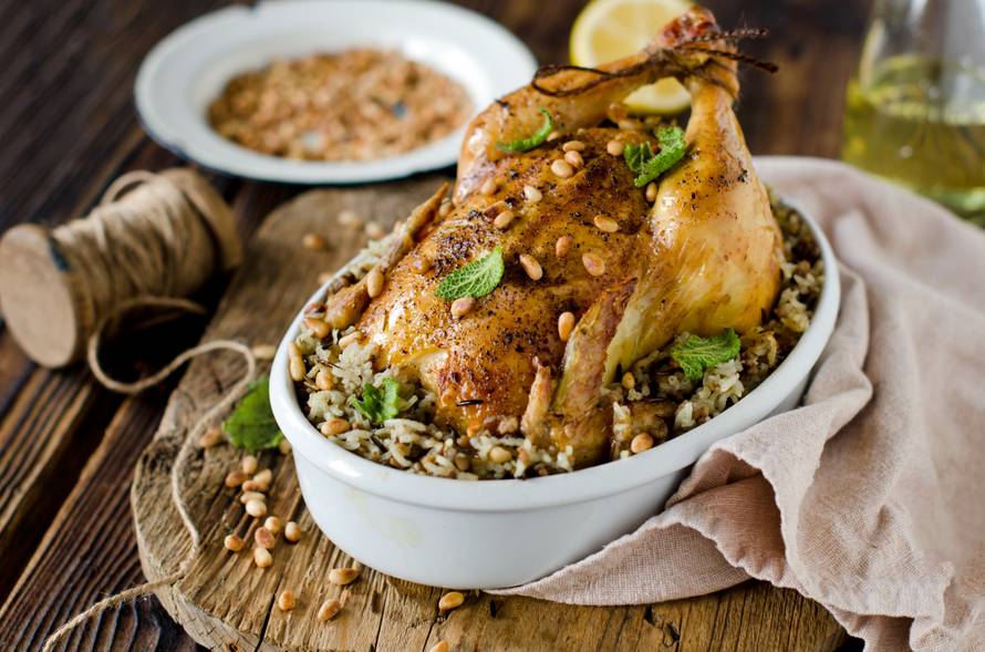 Chicken stuffed with rice and pine nuts