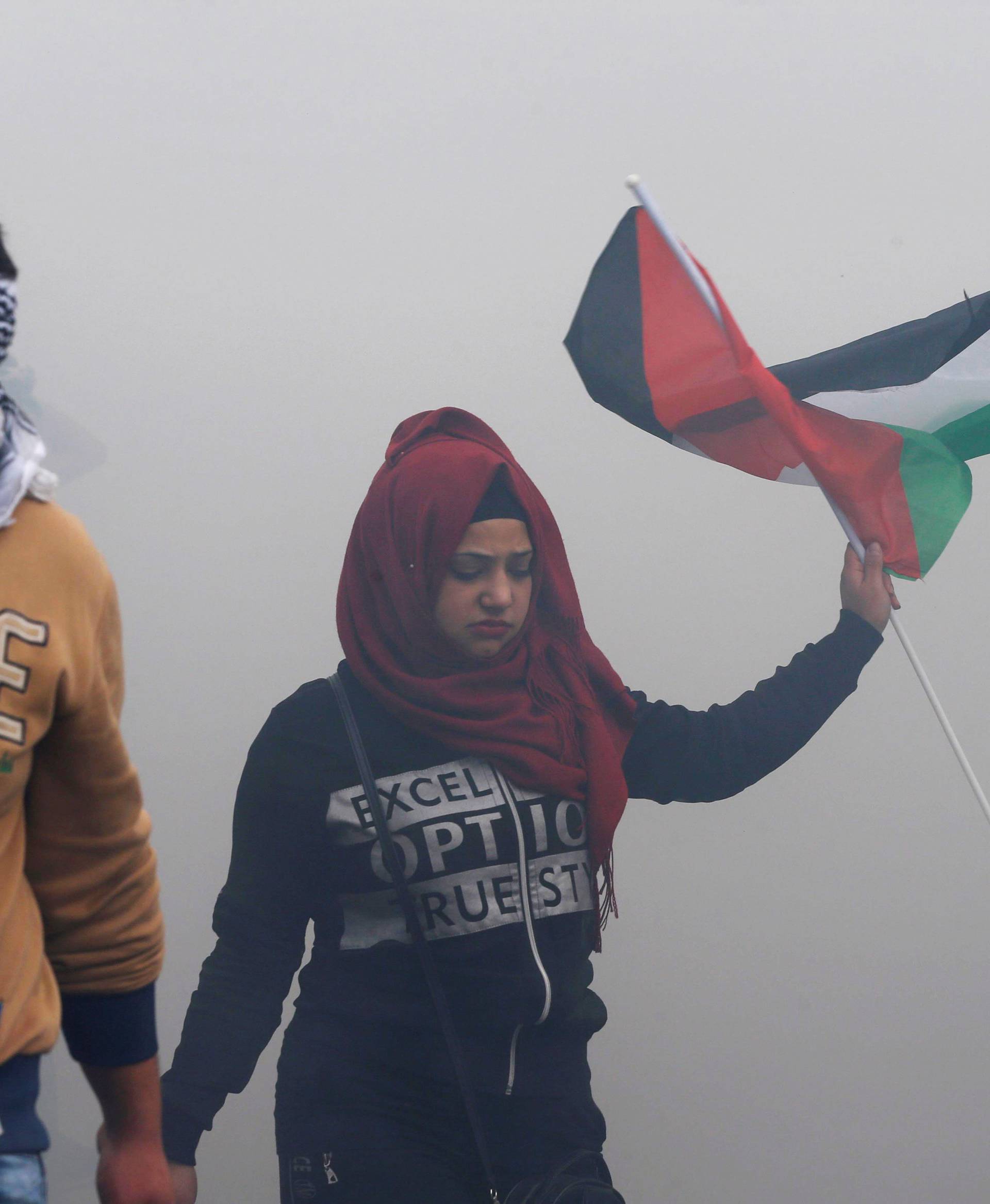 Protesters are seen near the U.S. embassy in Awkar east of Beirut