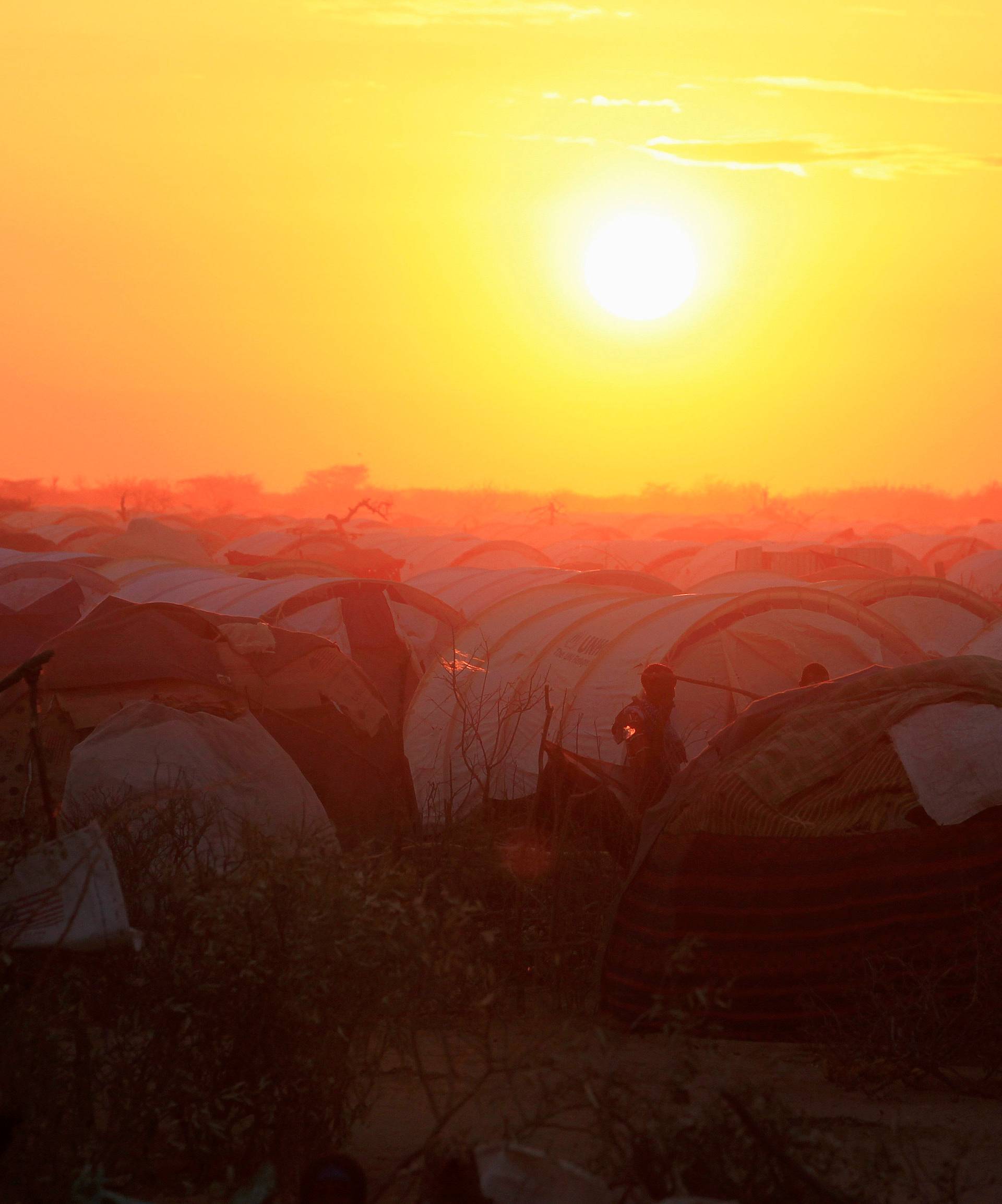 FILE PHOTO: The sun sets over the Ifo extension refugee camp in Dadaab, near the Kenya-Somalia border, in Garissa County
