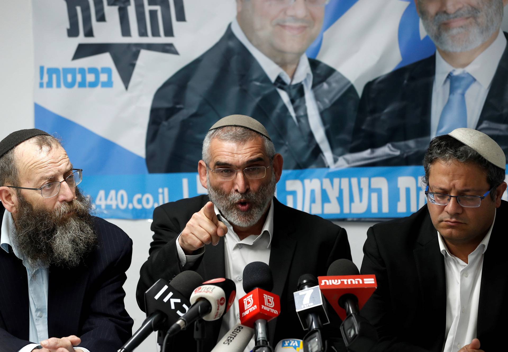 Michael Ben-Ari from the Jewish Power party delivers a statement to the media together with his party's members, Baruch Marzel and Itamar Ben-Gvir in Jerusalem