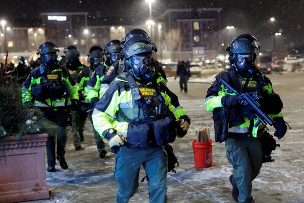 Protest outside the hotel where Bovino, who has been removed from his role, is reportedly staying, in Maple Grove