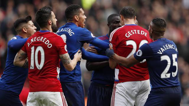 Manchester United's Eric Bailly clashes with Middlesbrough's Rudy Gestede