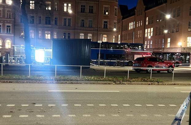 A view of the site where a bus hit a bus stop in central Stockholm