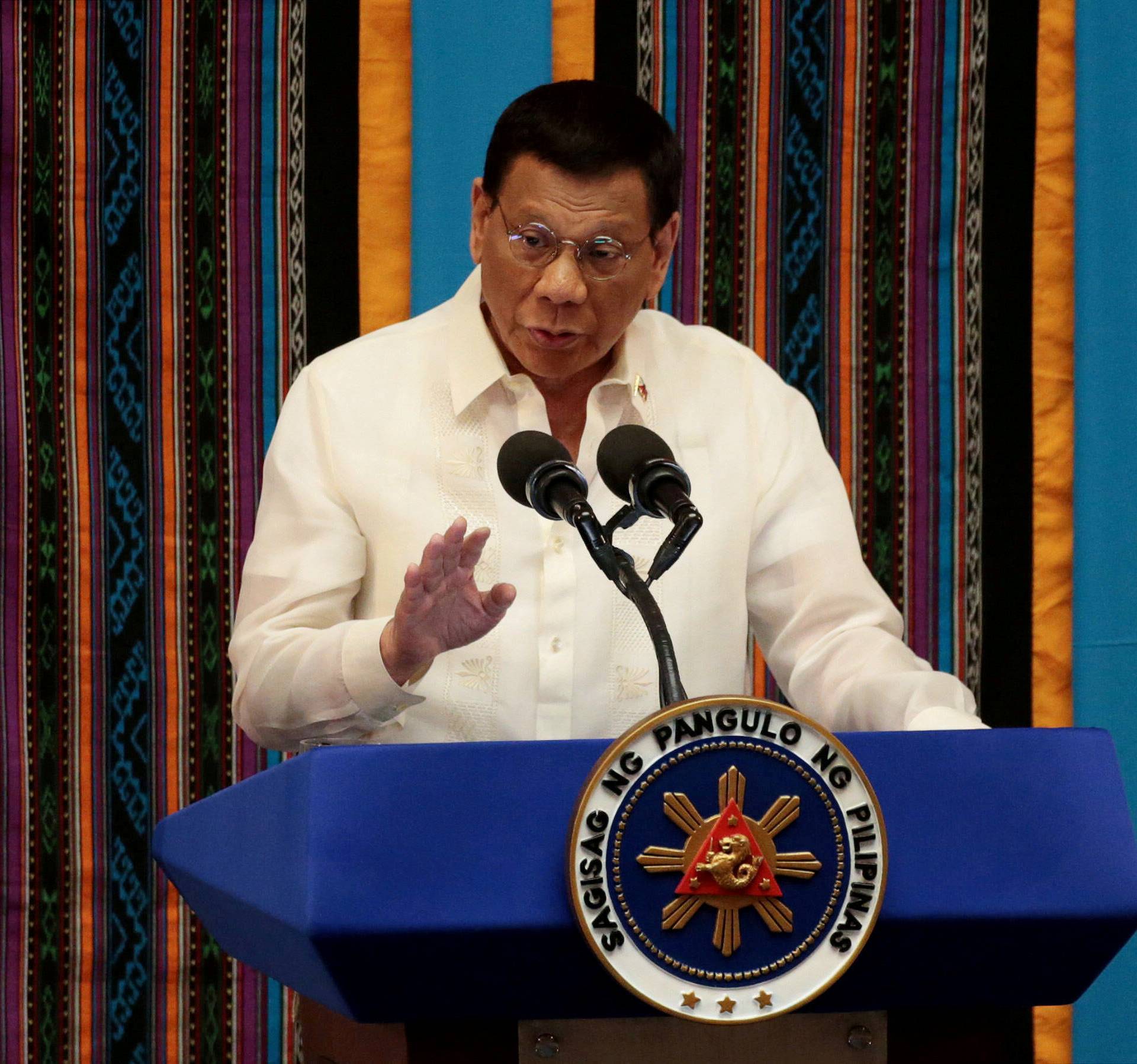 FILE PHOTO: Philippine President Rodrigo Duterte gestures during his fourth State of the Nation Address at the Philippine Congress in Quezon City