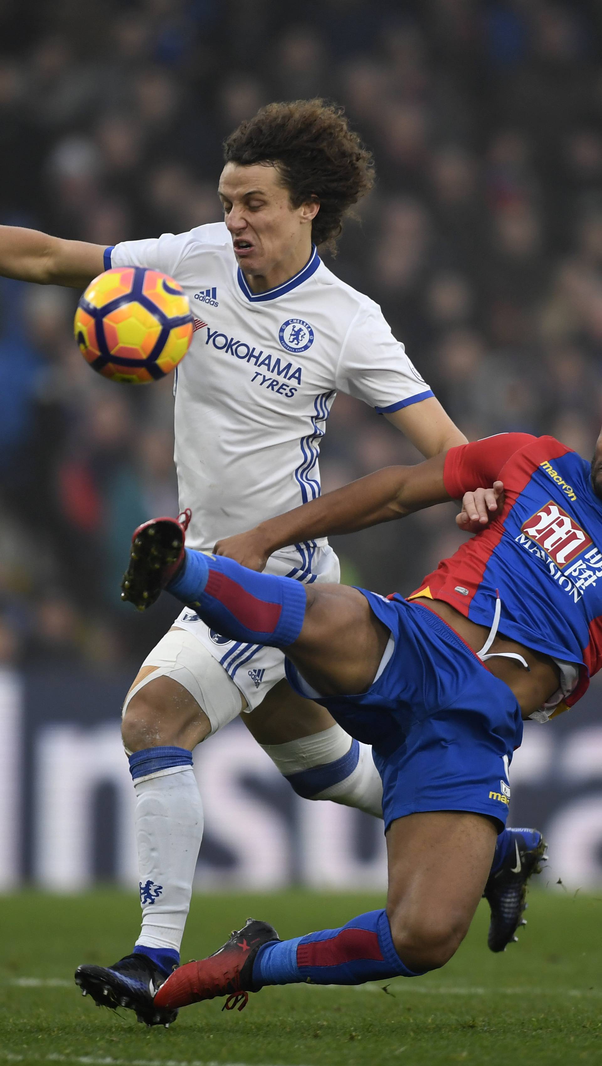 Crystal Palace's Fraizer Campbell in action with Chelsea's David Luiz