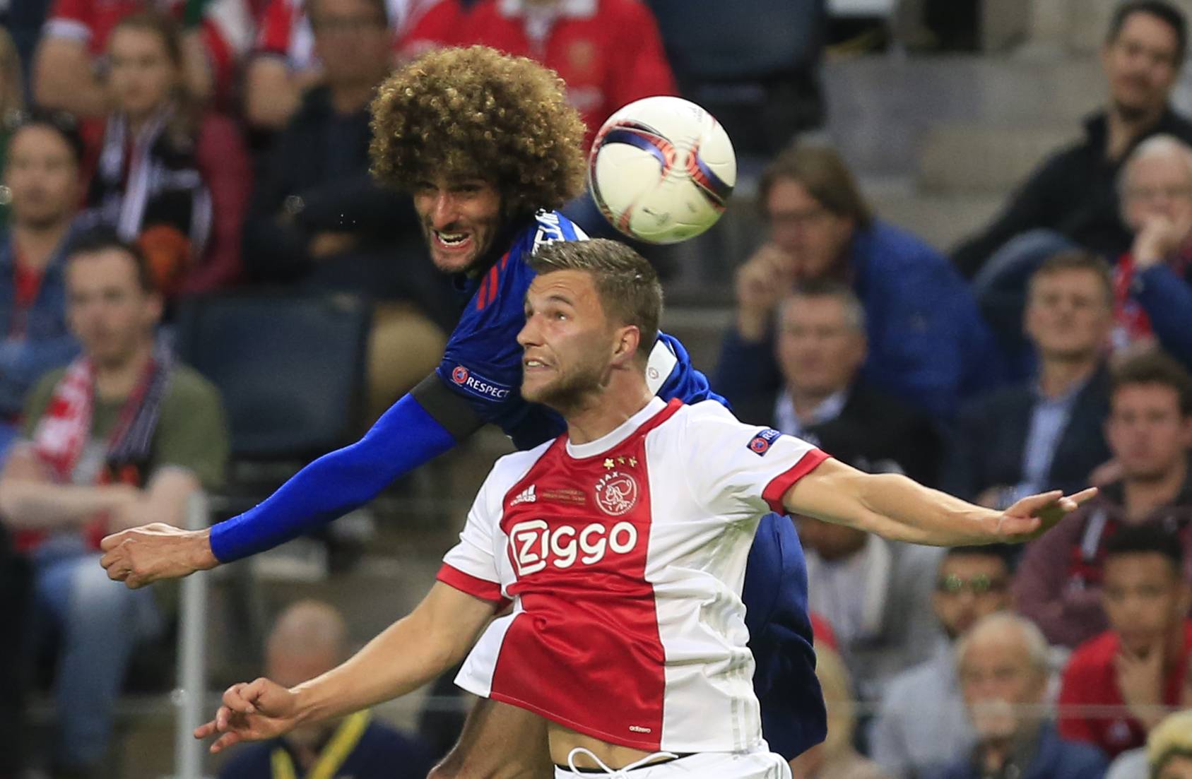 Ajax's Joel Veltman in action with Manchester United's Marouane Fellaini