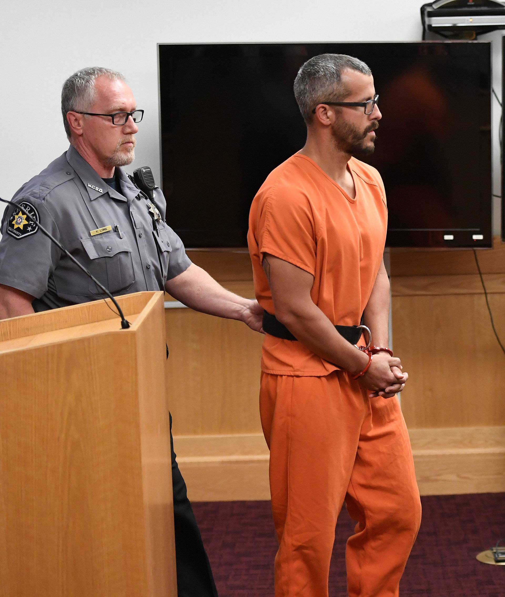 FILE PHOTO: Christopher Watts appears in court for his arraignment hearing in Greeley