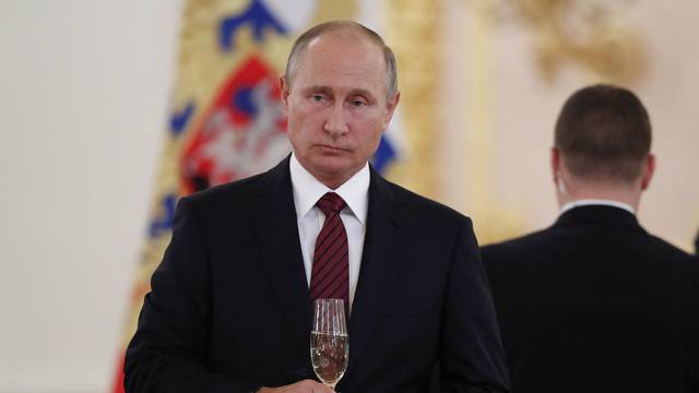 FILE PHOTO: Russian President Putin attends a ceremony to receive credentials from foreign ambassadors in Moscow