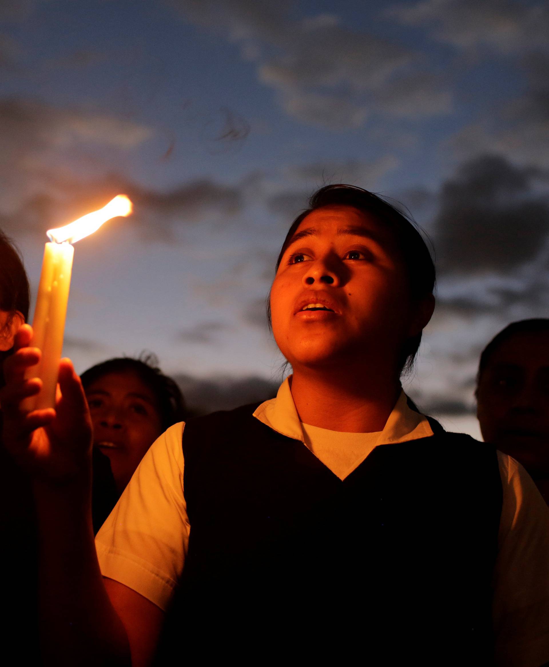 A vigil for victims after a fire broke out at the Virgen de Asuncion home in San Jose Pinula, on the outskirts of Guatemala City,