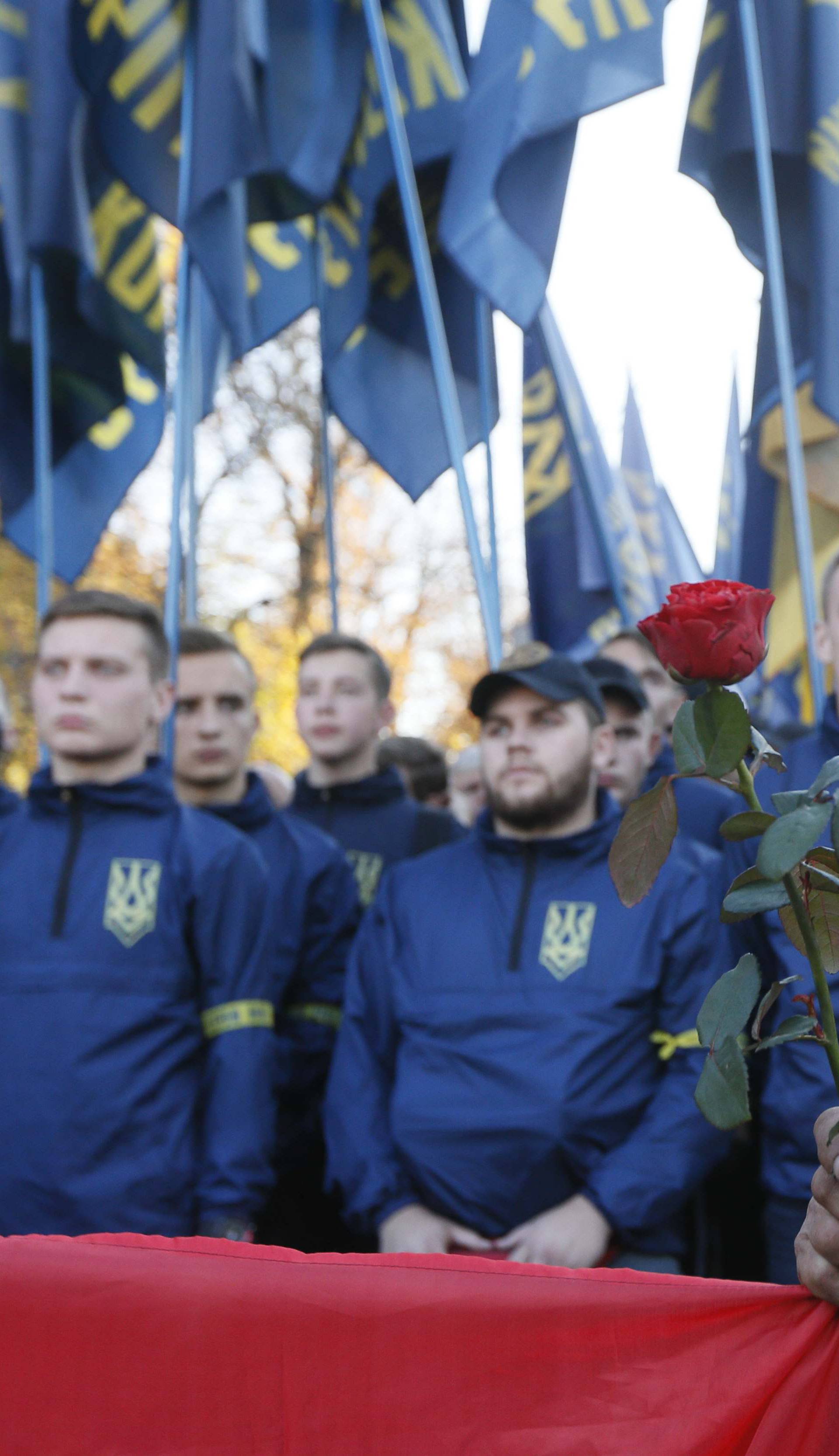 People take part in a procession to mark the Defender of Ukraine Day in Kiev