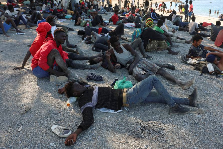 Mass crossings of migrants on foot and by sea from Morocco into Spanish territory, in Ceuta