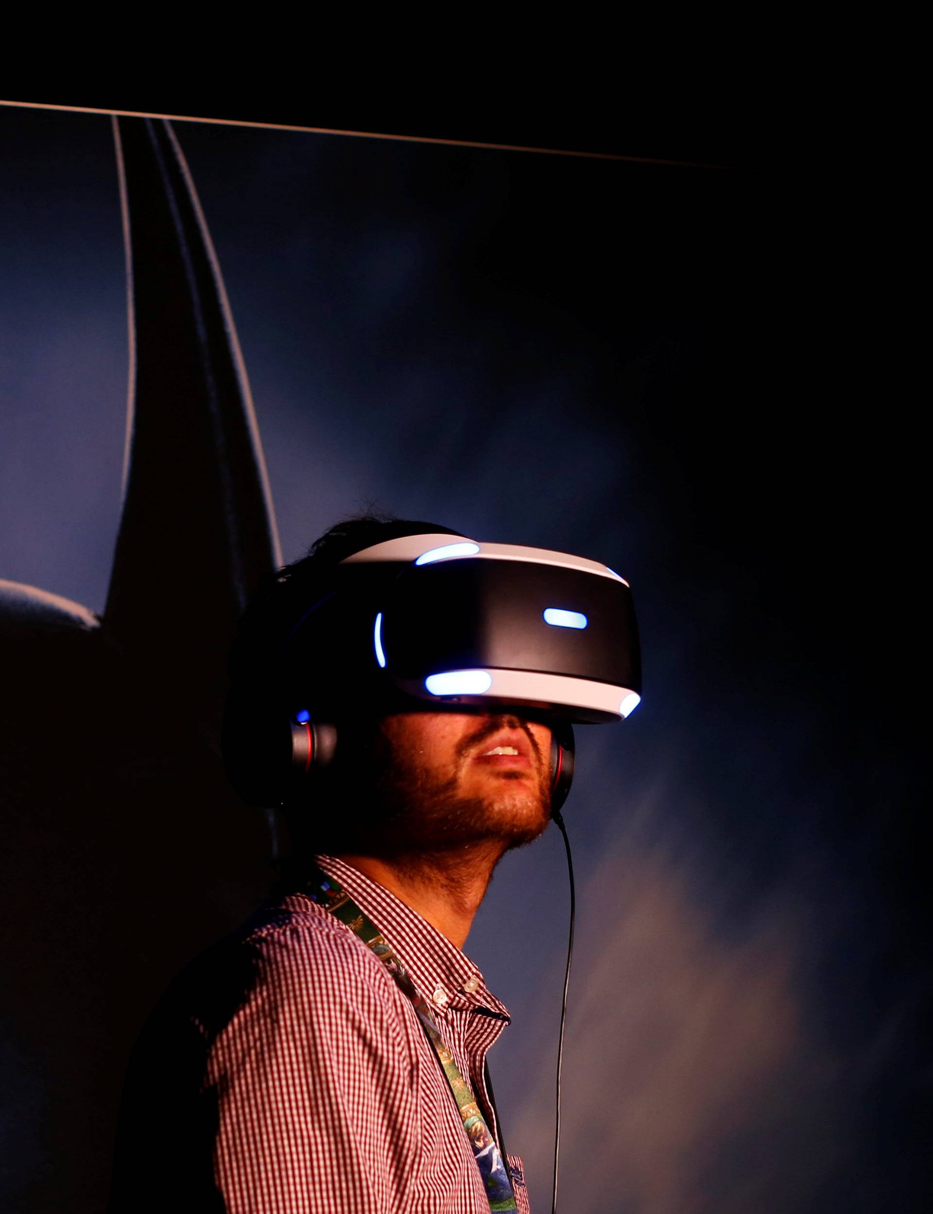 People try the new Sony VR headset during Sony Corporation's PlayStation 4 E3 2016 event in Los Angeles