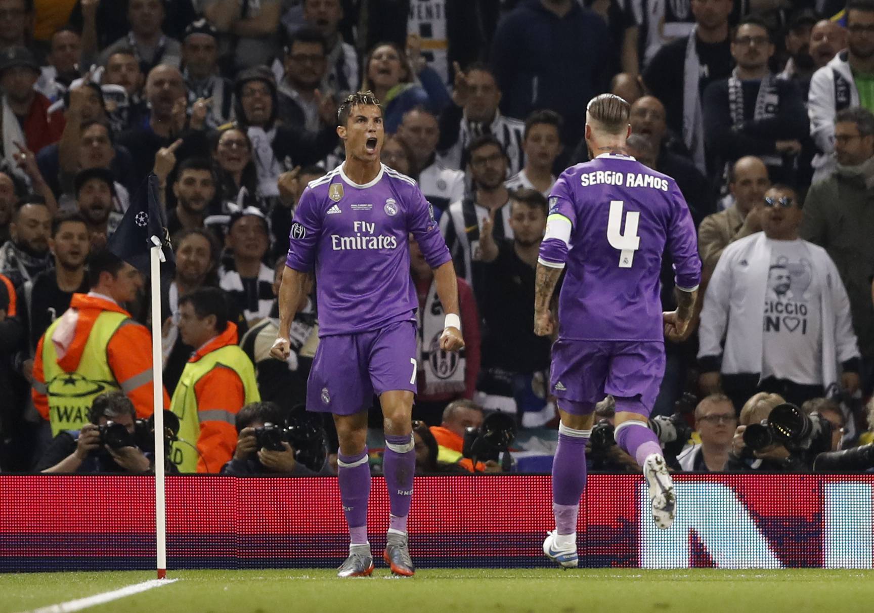Real Madrid's Cristiano Ronaldo celebrates scoring their first goal with Sergio Ramos