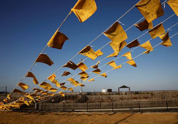 Yellow handkerchiefs with messages supporting people in areas hit by the 2011 earthquake and tsunami are hanged ahead of the 10th anniversary of Fukushima disaster, in Iwaki