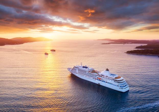 Croatia.,Aerial,View,At,The,Cruise,Ship,During,Sunset.,Adventure
