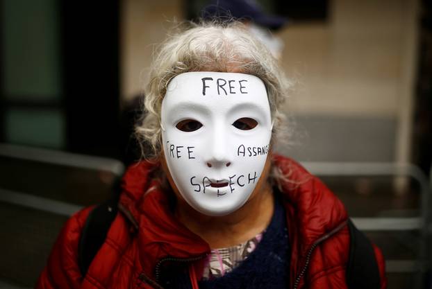 Supporters of WikiLeaks founder Julian Assange protest outside of Westminster Magistrates Court in London
