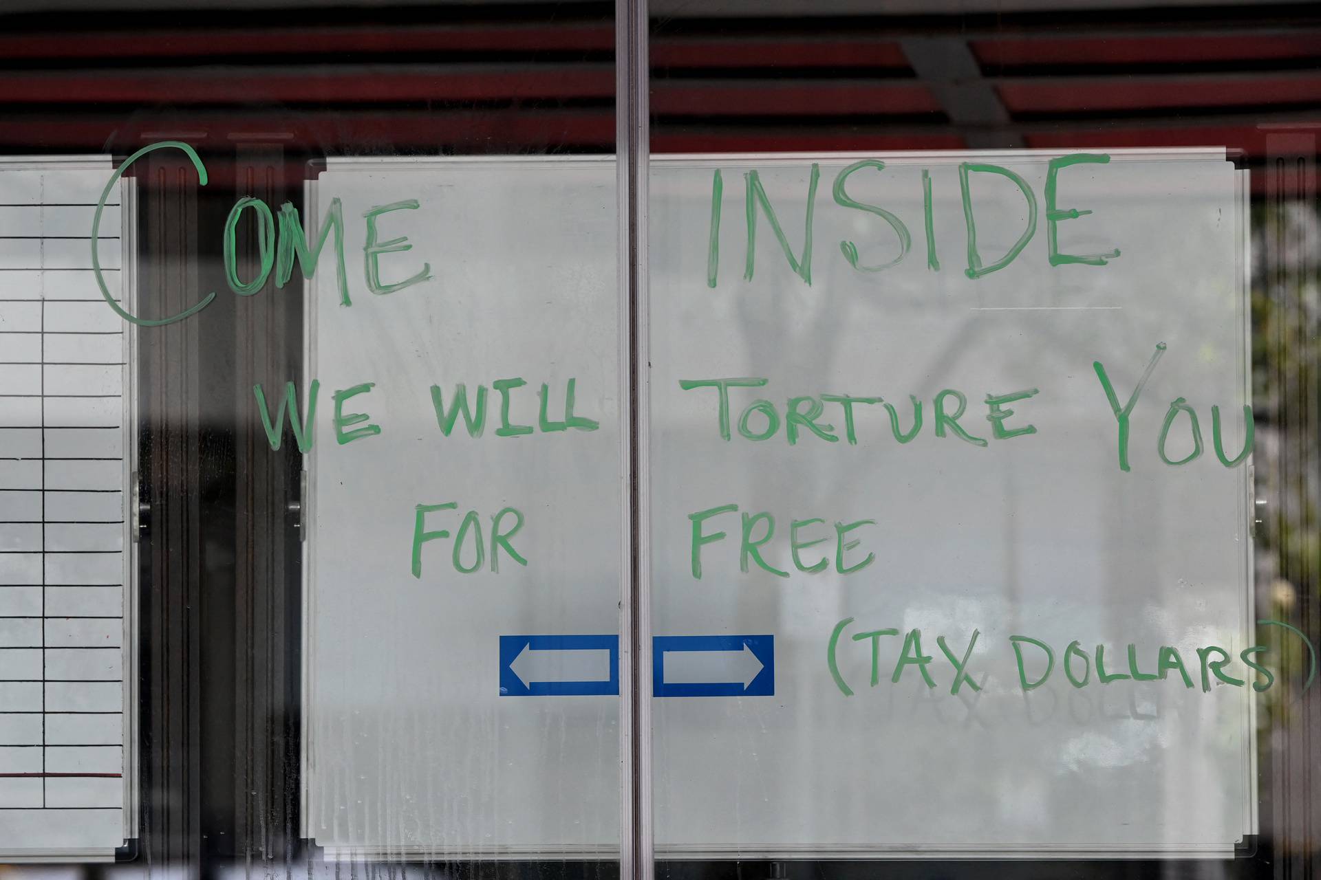 A sign is seen at the Park Hotel, believed to be holding Novak Djokovic of Serbia in Melbourne