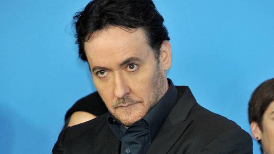 Cusack snimao na prosvjedu pa ga napala policija: Udarali ga