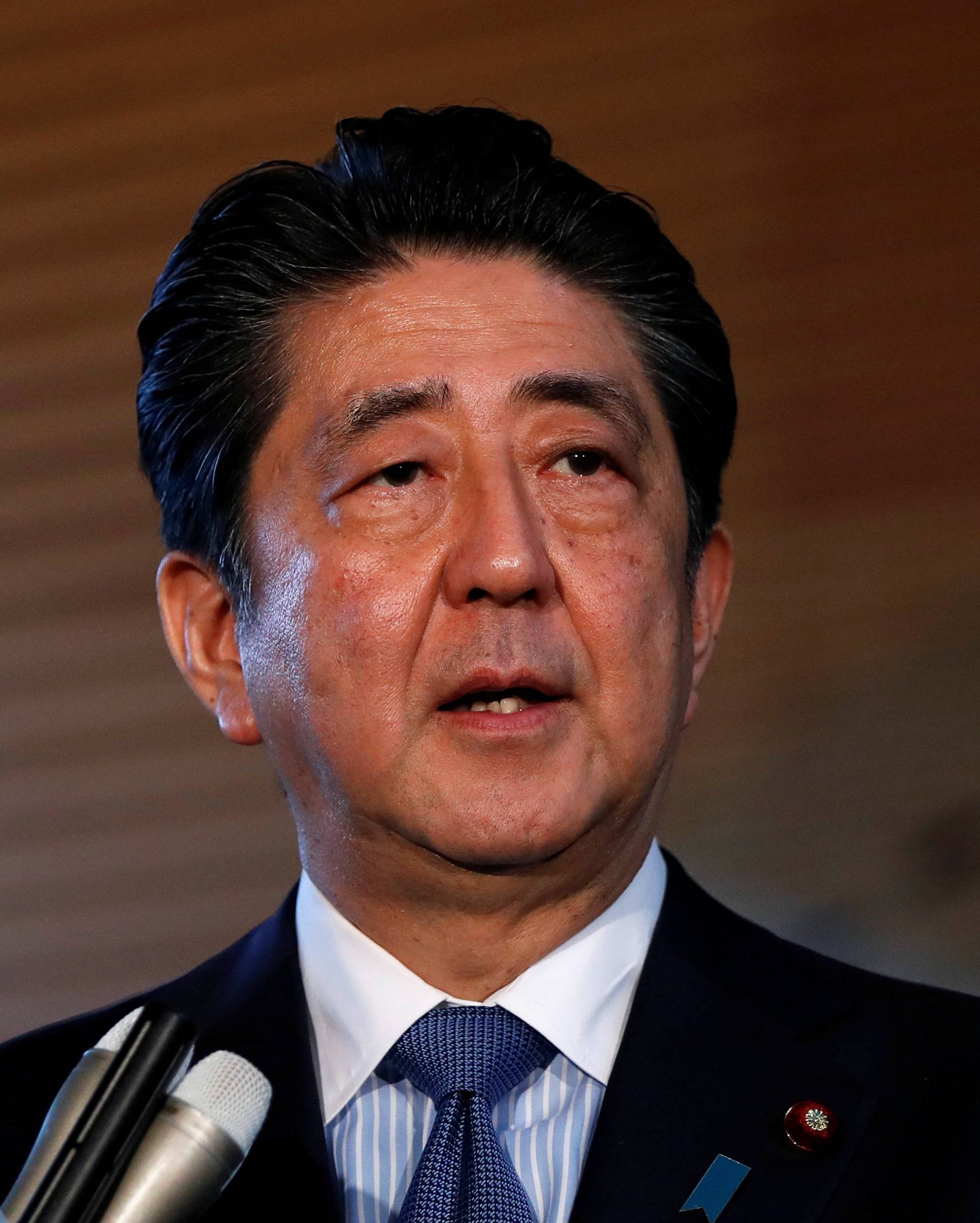 Japan's Prime Minister Shinzo Abe speaks to media after the news conference by the U.S. President Donald Trump, after the summit between the U.S. and North Korea, in Tokyo