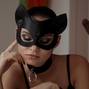 Brunette girl in a cat mask
