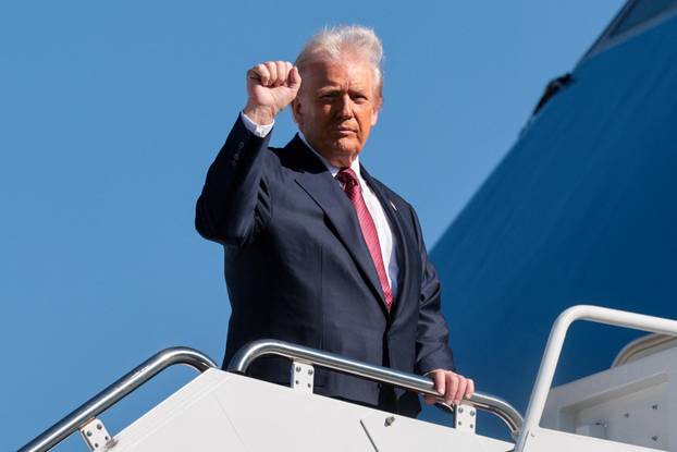 U.S. President Trump boards Air Force One as he departs for Florida from Joint Base Andrews