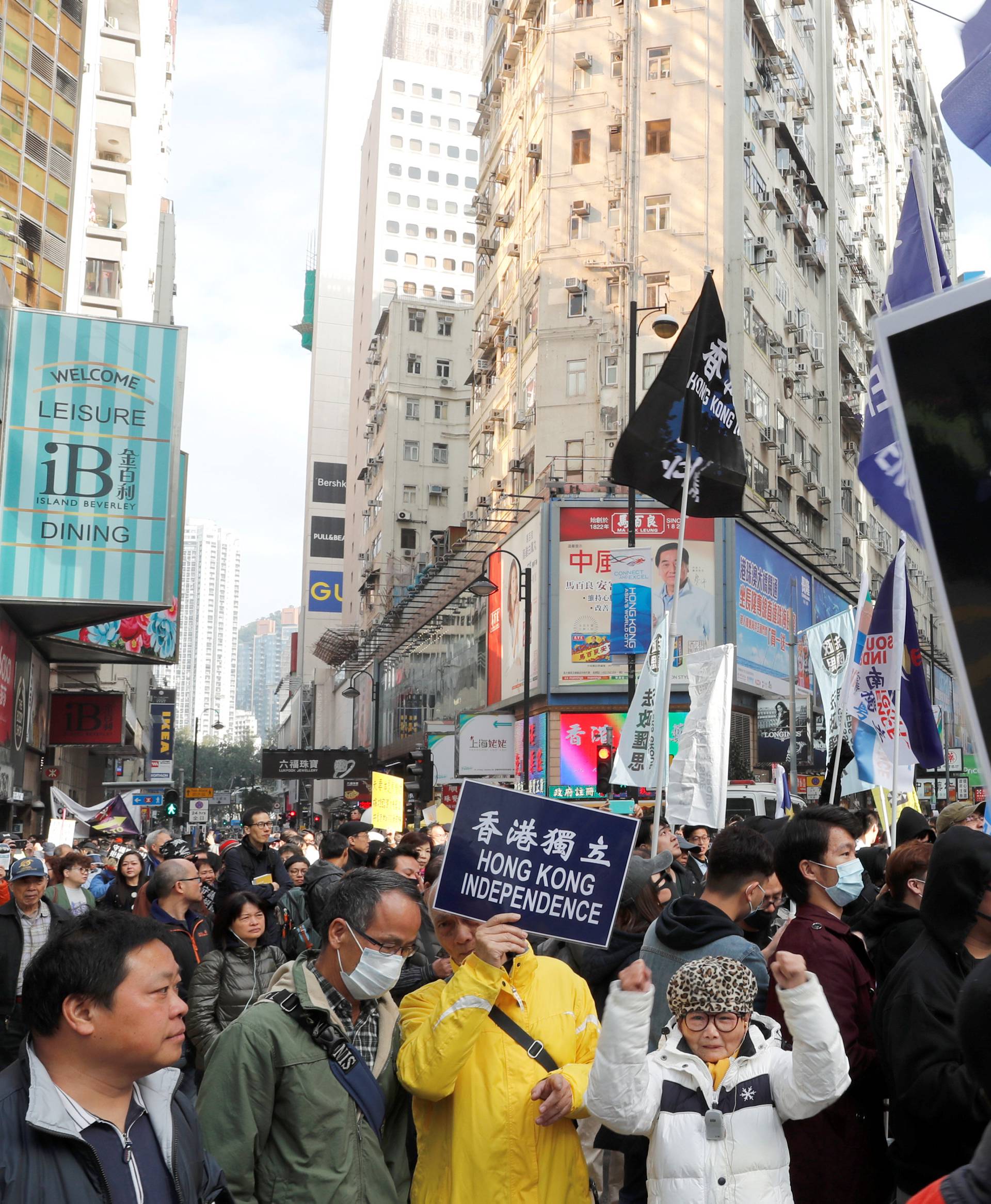 Pro-independence supporters take part in an annual New Year's Day march in Hong Kong