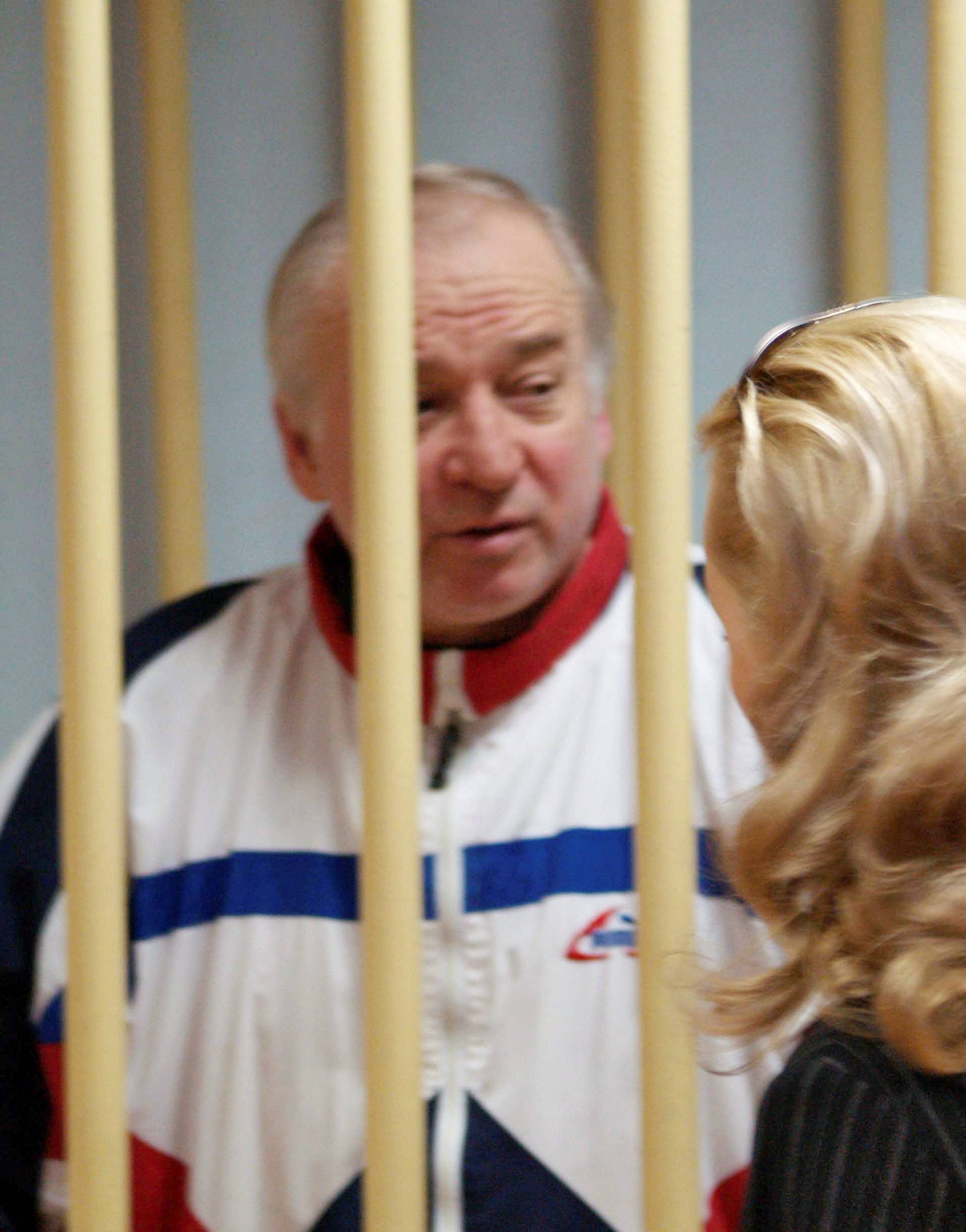 Sergei Skripal, a former colonel of Russia's GRU military intelligence service, looks on inside the defendants' cage as he attends a hearing at the Moscow military district court