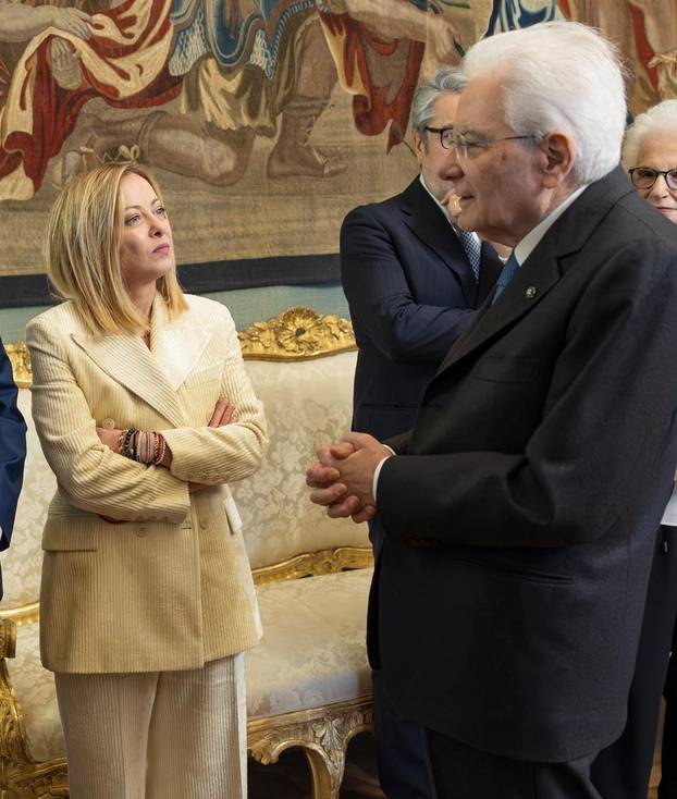 Italian Prime Minister Giorgia Meloni shakes hands with Italian President Sergio Mattarella