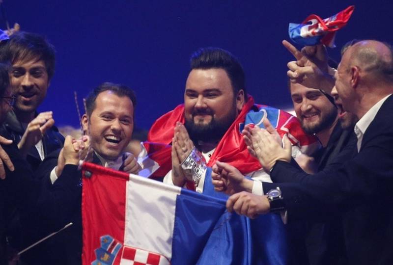 Croatia's Jacques Houdek celebrates with team after the Eurovision Song Contest 2017 Semi-Final 2 at the International Exhibition Centre in Kiev