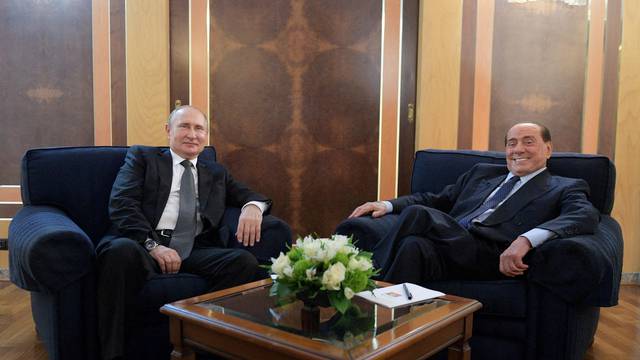 FILE PHOTO: Russian President Putin meets with Italian Member of the European Parliament Berlusconi in Rome