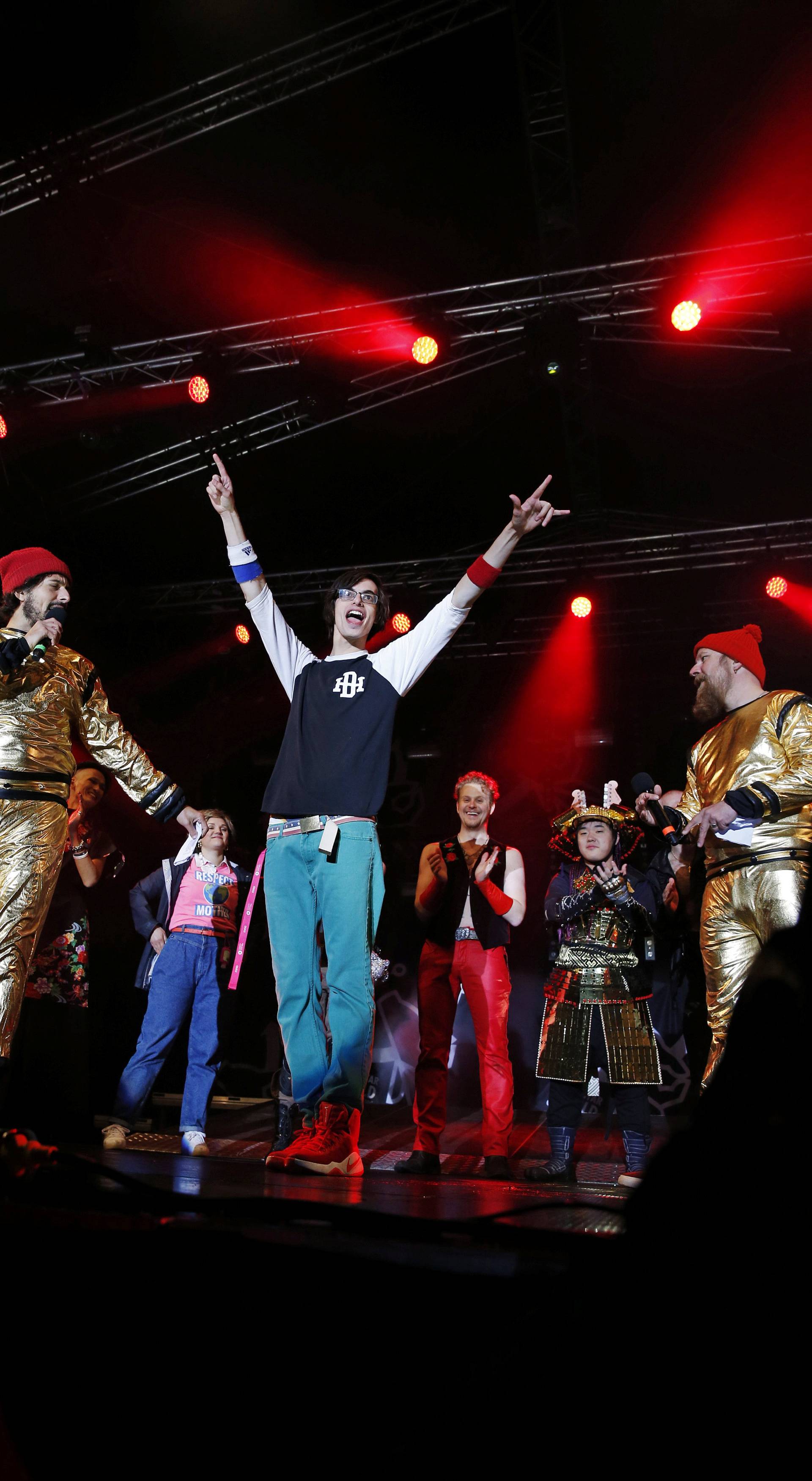 Winner Matt "Airistotle" Burns of the U.S. celebrates during the final of the Air Guitar World Championships in Oulu