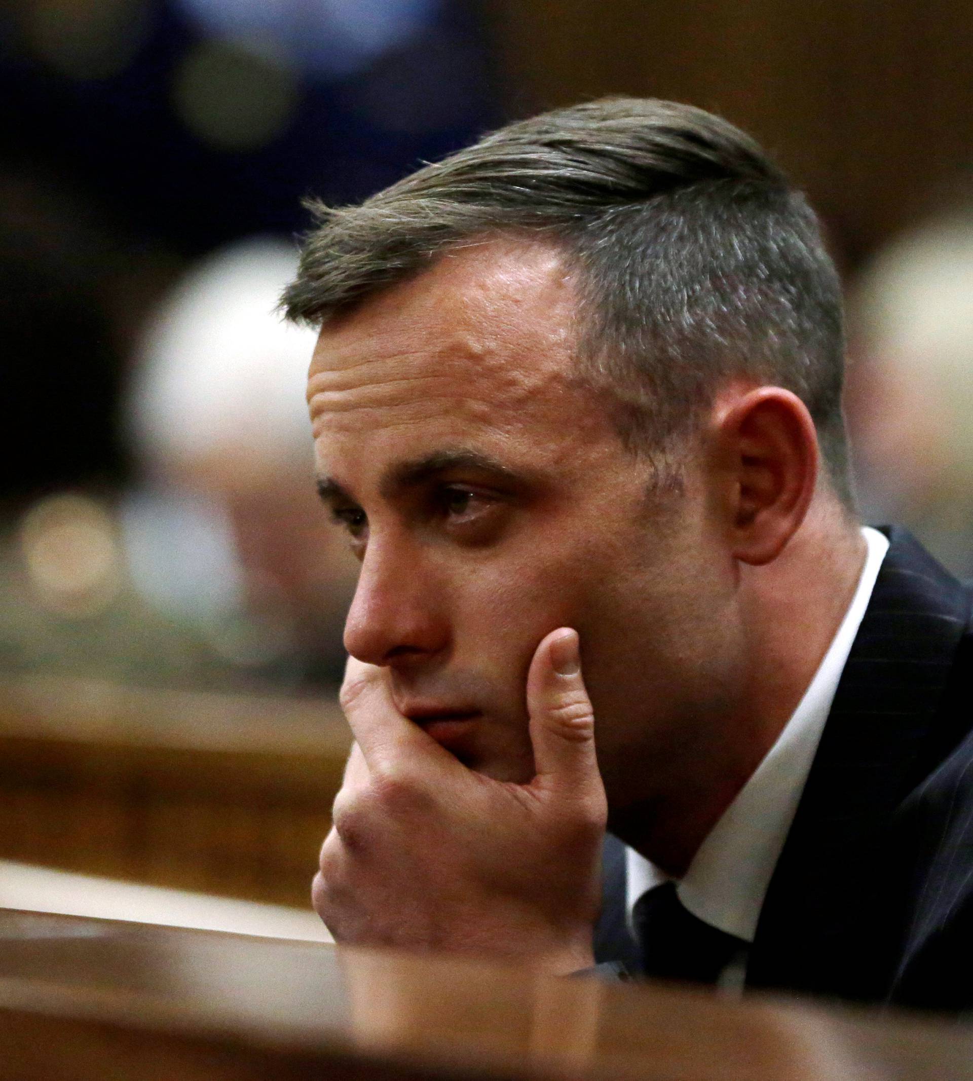 Former Paralympian Oscar Pistorius attends the sentencing for the murder of Reeva Steenkamp at the Pretoria High Court