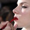 A model is prepped backstage before the Longchamp show during New York Fashion Week