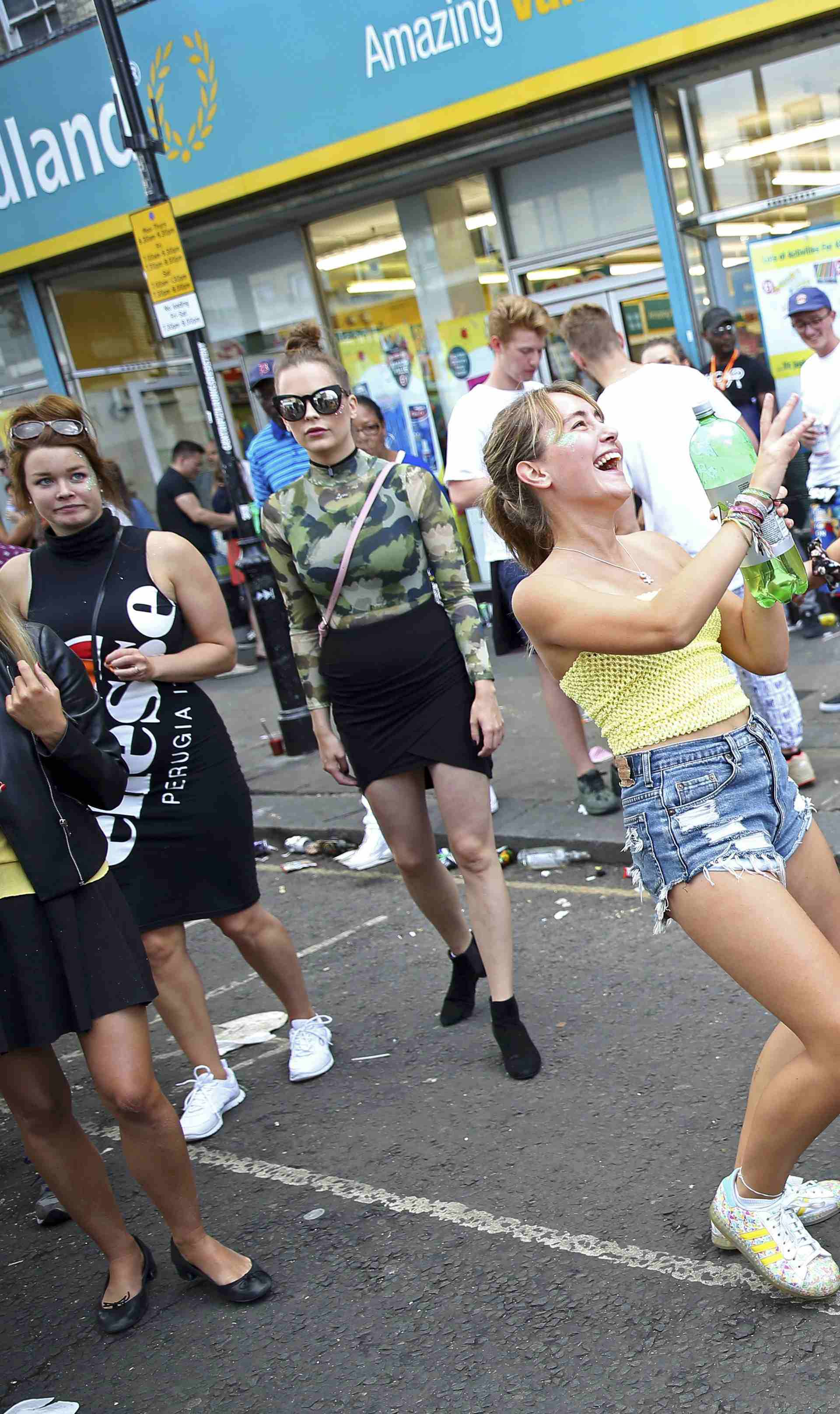 People dance during the Notting Hill Carnival in London