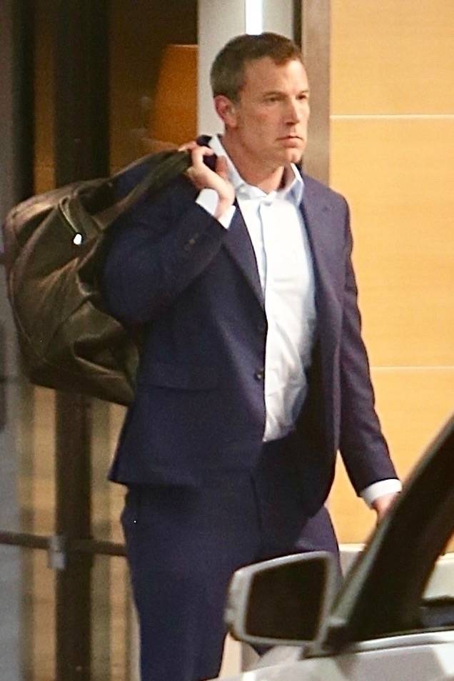 Ben Affleck arrives at his office in Beverly Hills with a leather overnight bag, leaving suited up but looking upset