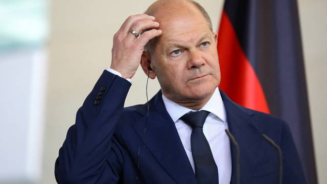 German Chancellor Olaf Scholz attends a press conference at the Chancellery in Berlin