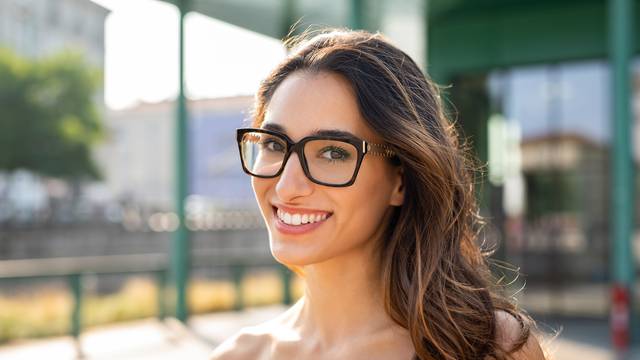Smiling woman wearing eyeglasses outdoor