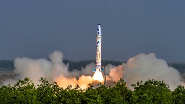 "Chongqing Liangjiang Star" rocket, developed by Chinese private firm OneSpace Technology, takes off from a launchpad in an undisclosed location in northwestern China