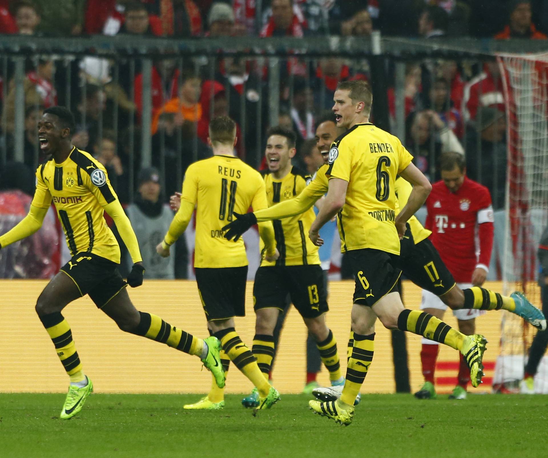 Borussia Dortmund's Ousmane Dembele celebrates scoring their third goal with team mates