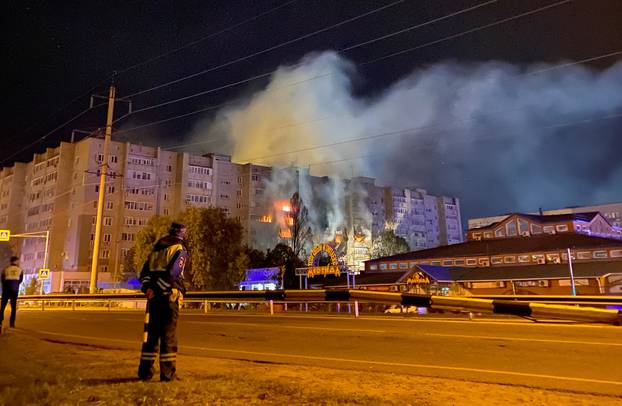 A view shows a site of a plane crash on residential building in the southern city of Yeysk