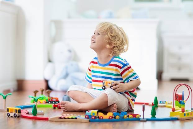 Kids,Play,With,Wooden,Railway.,Child,With,Toy,Train.,Educational