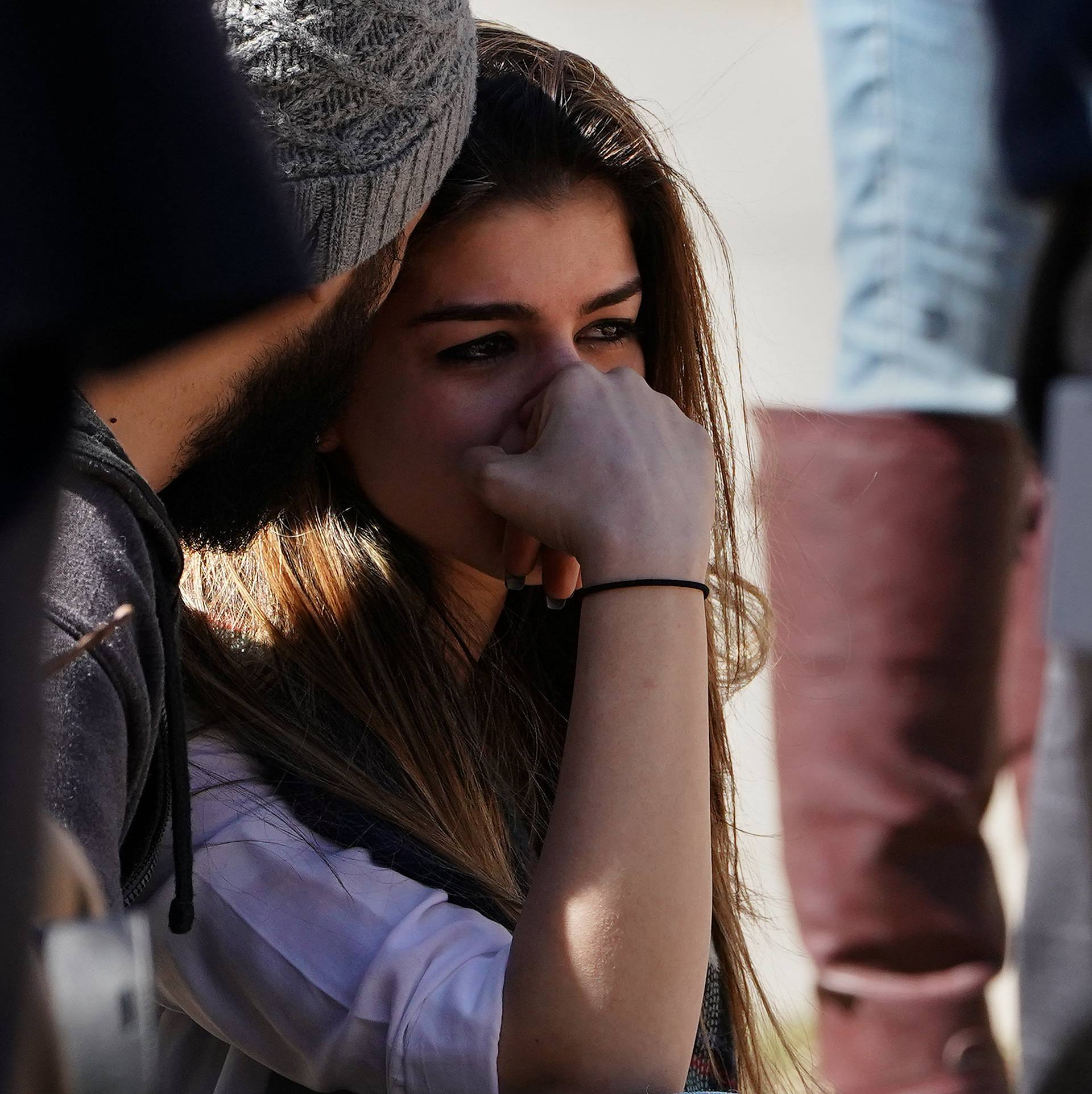 A witness is pictured at the scene of an incident where a van struck multiple people in Toronto