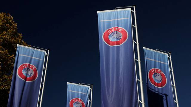FILE PHOTO: Flags with UEFA logo are seen in Nyon