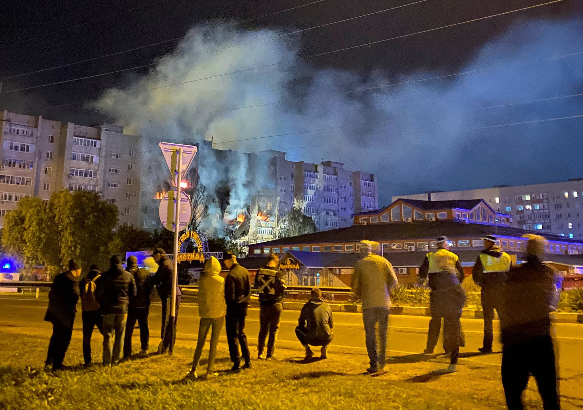 A view shows a site of a plane crash on residential building in the southern city of Yeysk