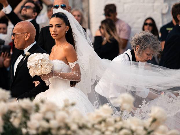 Locorotondo (Bari), Italy. 24 July 2026. Alessia Elefante at the Church of San Giorgio Martire in Locorotondo, southern Italy, at her wedding. Photo by Mattia Loiacono.