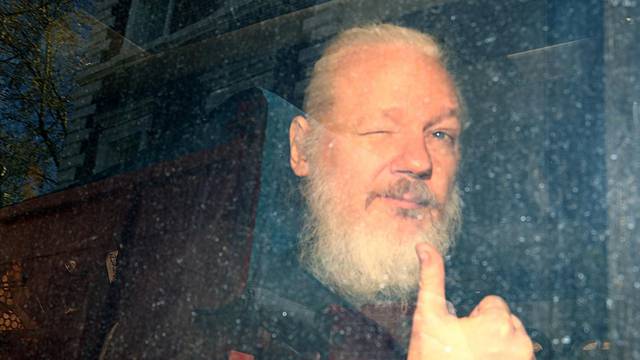FILE PHOTO: WikiLeaks founder Julian Assange arrives at the Westminster Magistrates Court, after he was arrested  in London