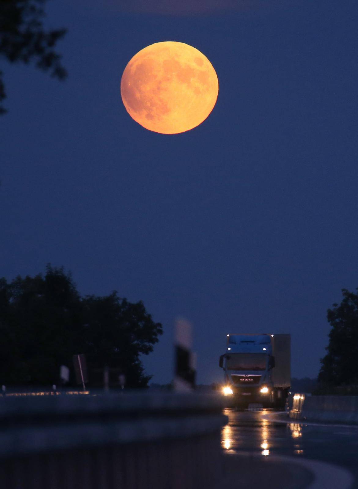 Full moon via motorway