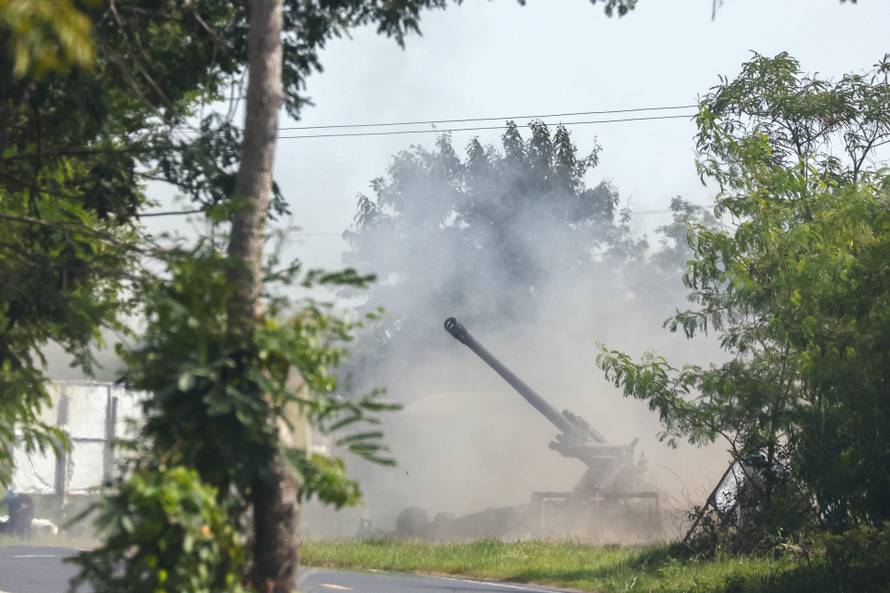 Thailand and Cambodia exchange heavy artillery as fighting rages for a second day