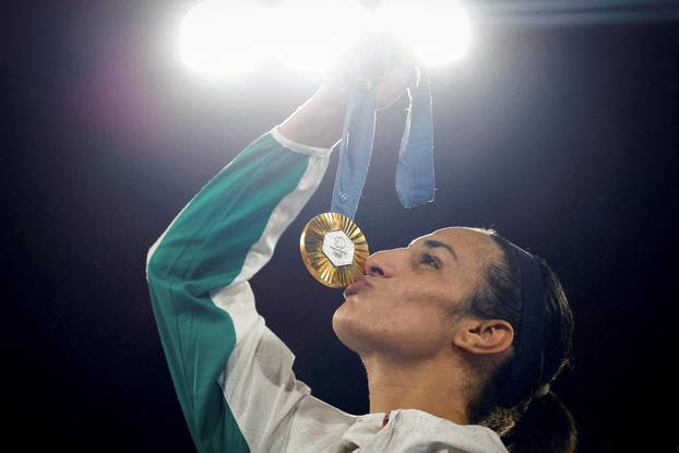 FILE PHOTO: FILE PHOTO: Gold medallist Imane Khelif of Algeria kisses her medal at the Paris 2024 Olympics