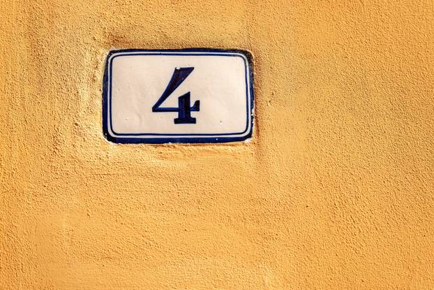 House Number Four on the wall - Bologna Italy